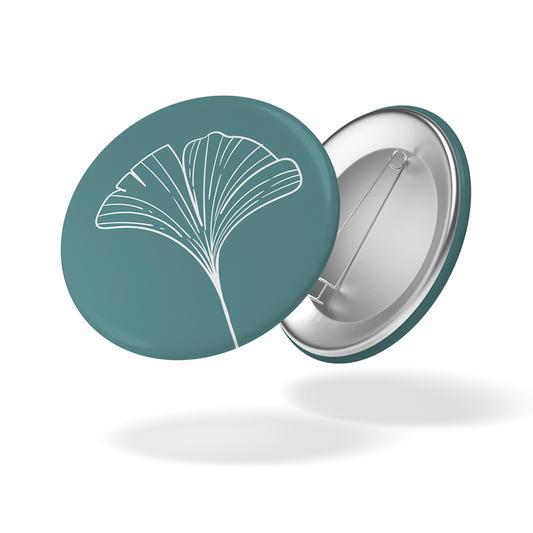 Badge - Fleur fond turquoise