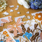 Beau puzzle Myosotis & Capucine par Maison Joliette